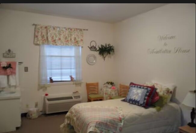 Private bedroom interior with bed and window at Mountbatten House